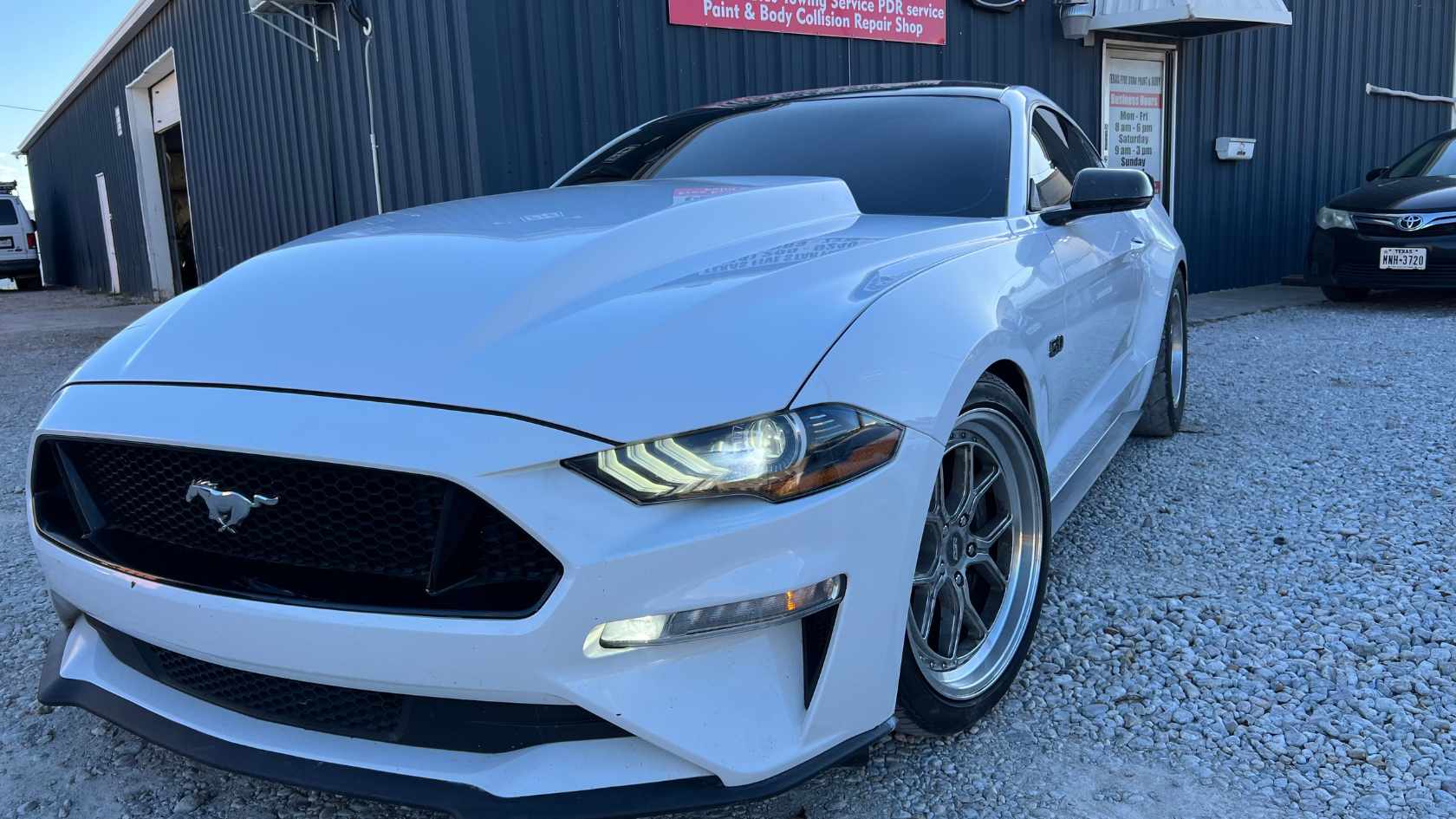 A high-performance vehicle with custom body modifications.