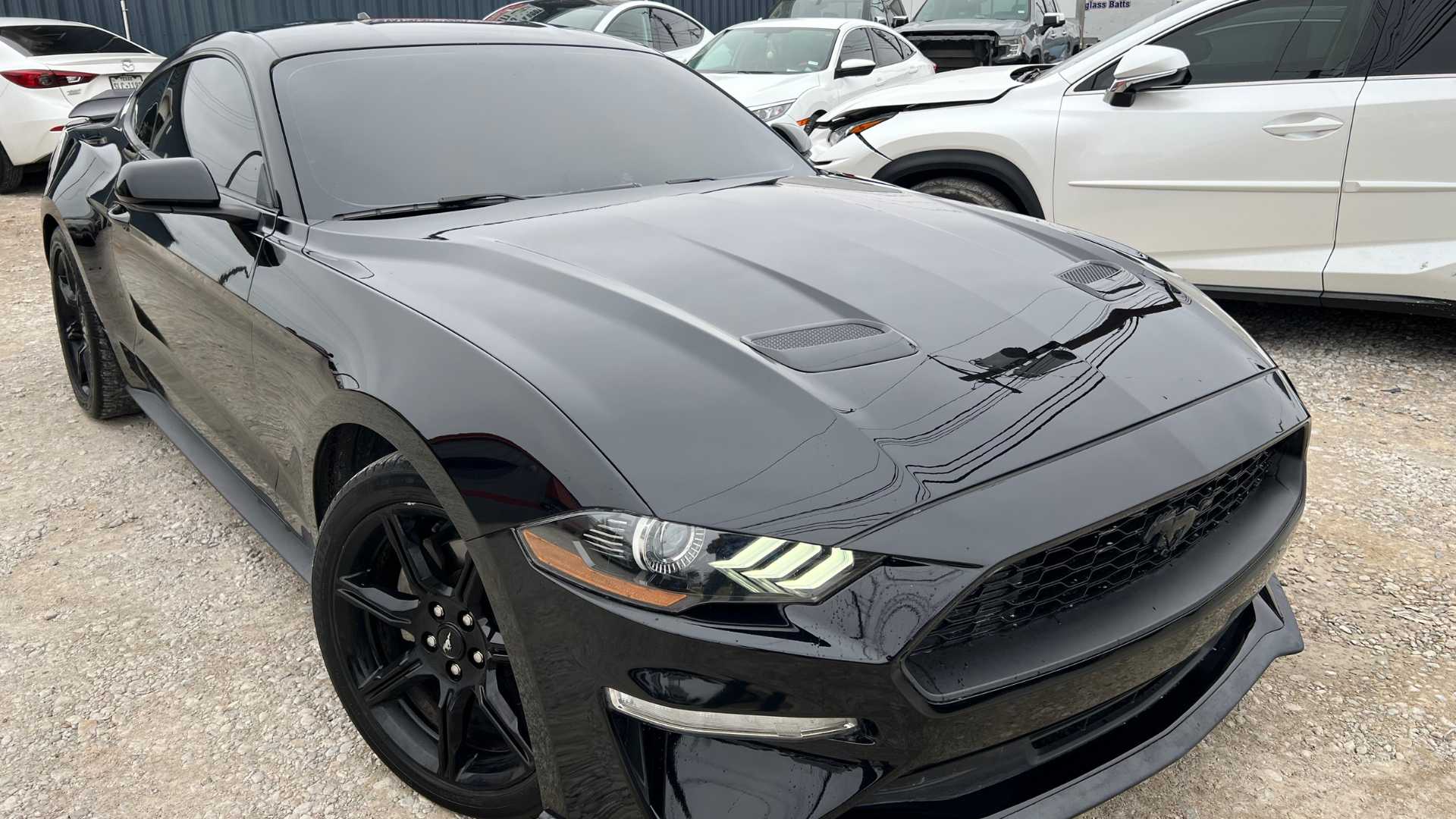 A car with a new vinyl wrap design.