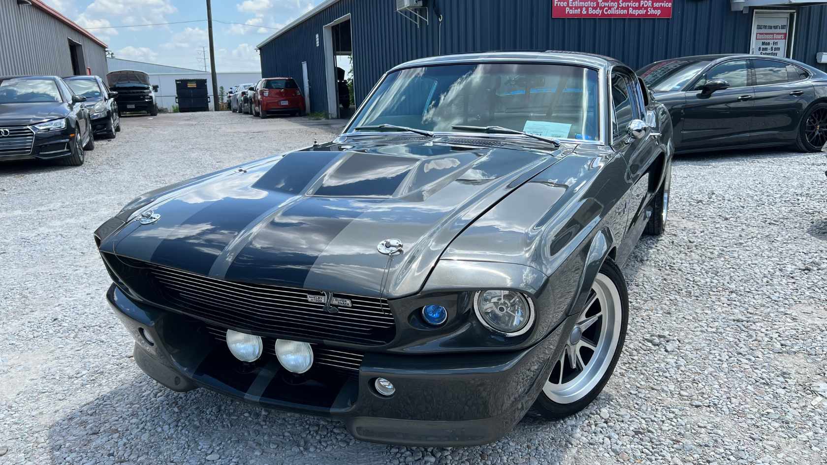 A classic American muscle car with a new custom red paint finish.