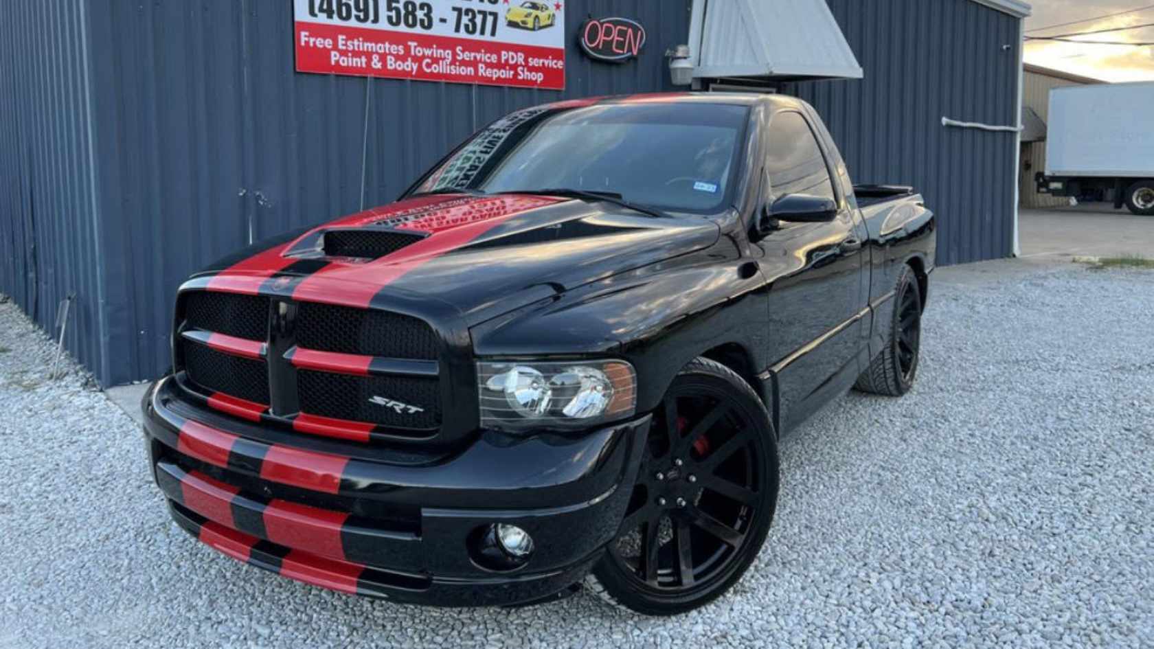 Detailed view of a seamless bumper repair on a silver vehicle.