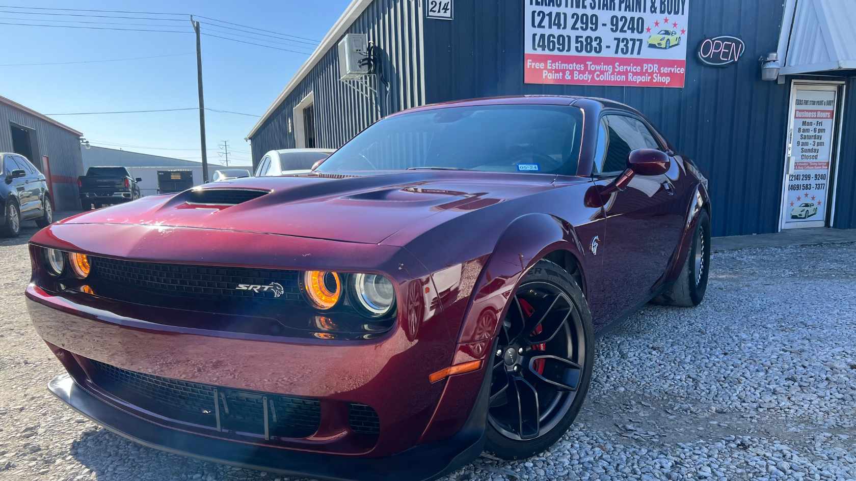 A luxury convertible with a deep, reflective paint finish.