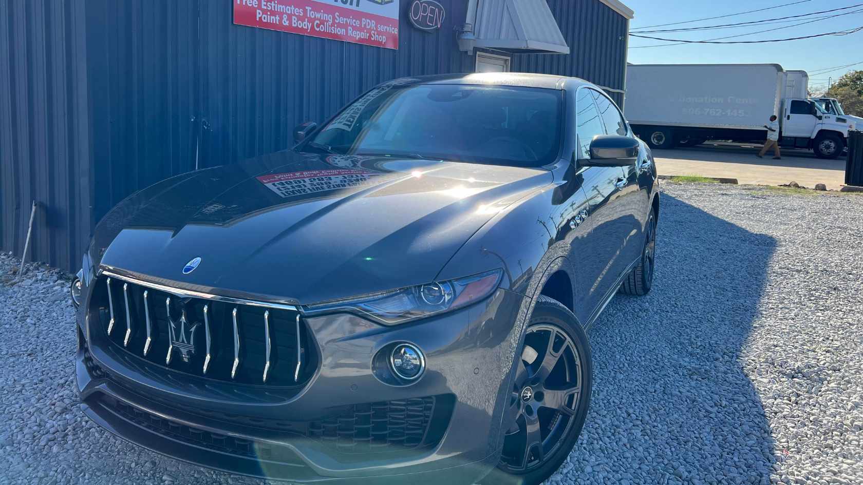 A classic American muscle car with a new custom red paint finish